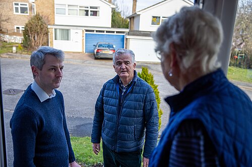 Will Forster and Leslie Rice on the doorstep